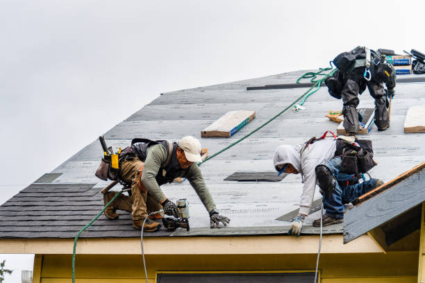 Professional Roofing technician working in Cos Cob, CT